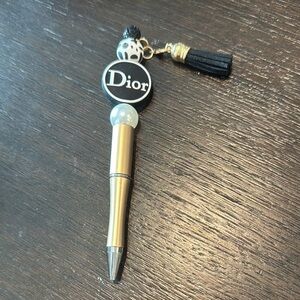 Dior Gold and Black Writing Instrument with Tassel